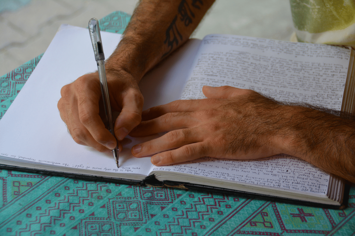 man journaling